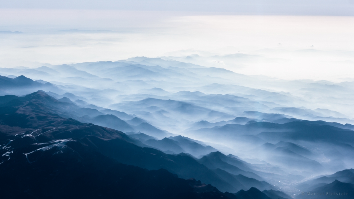 Clouds chasing the alps 4k wallpaper