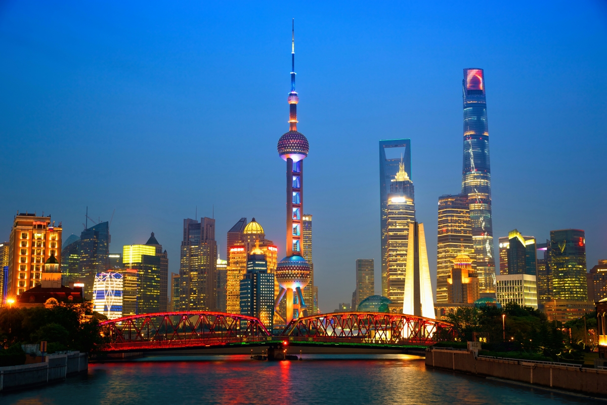 Shanghai skyscrapers by the river at night 4K