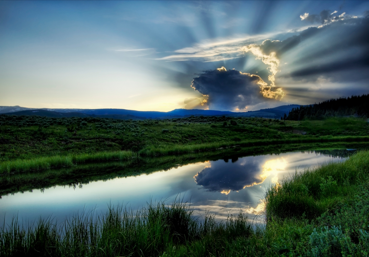 The sky, water, lake, clouds cover the sun