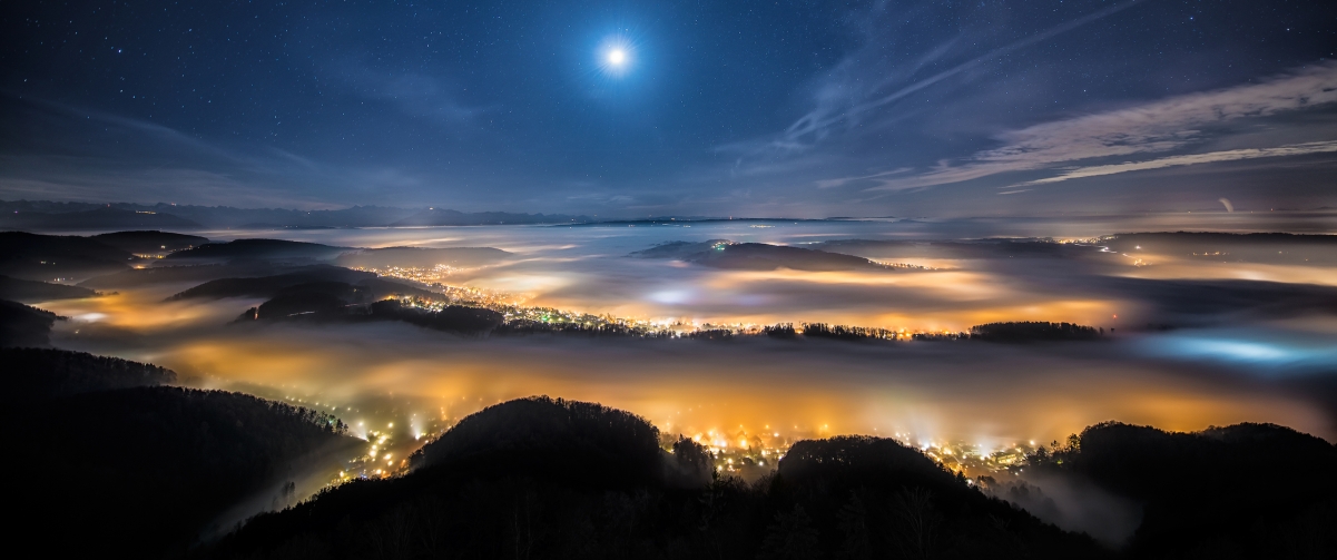 Swiss alpine peak night sky wind