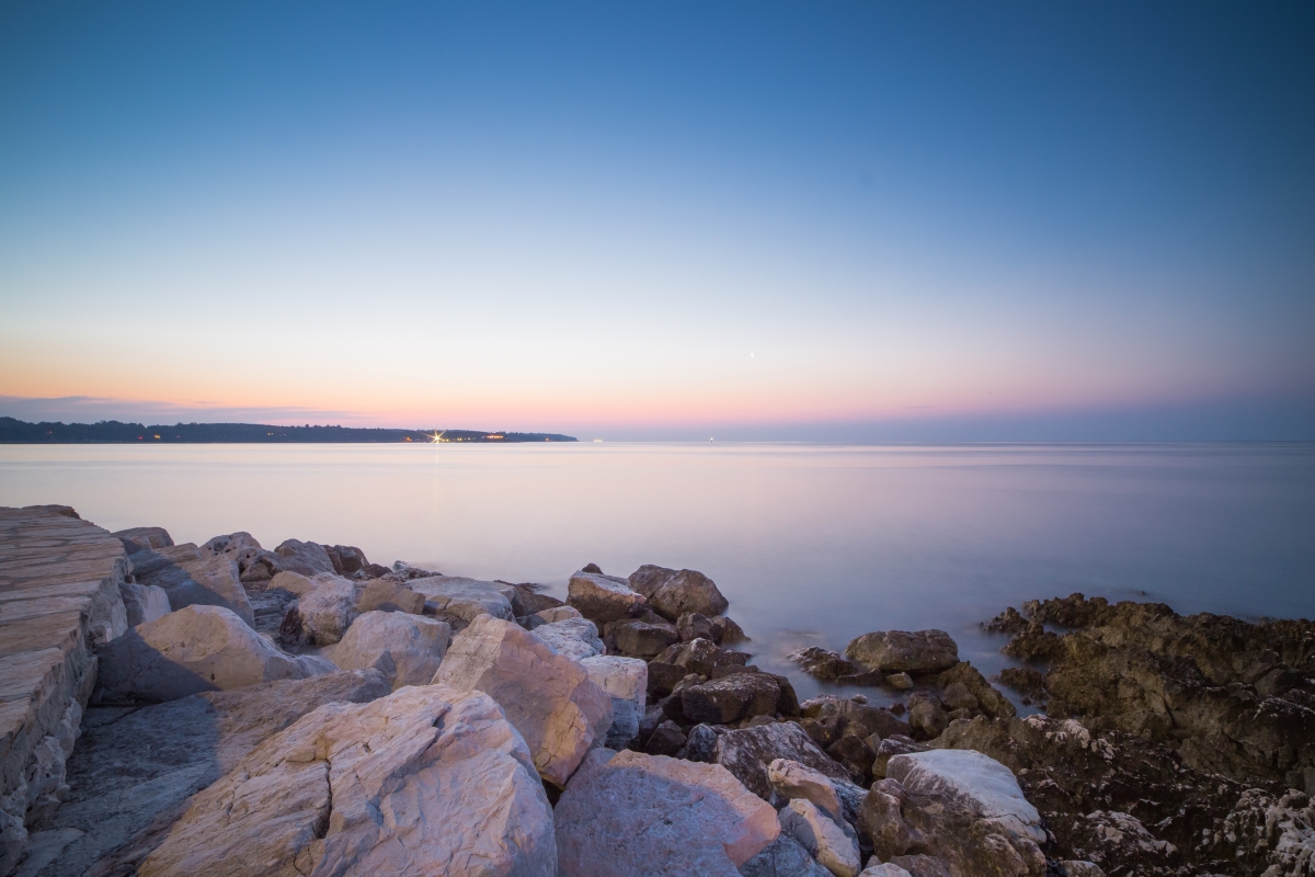 Beautiful sunset over the rocks by the sea 4