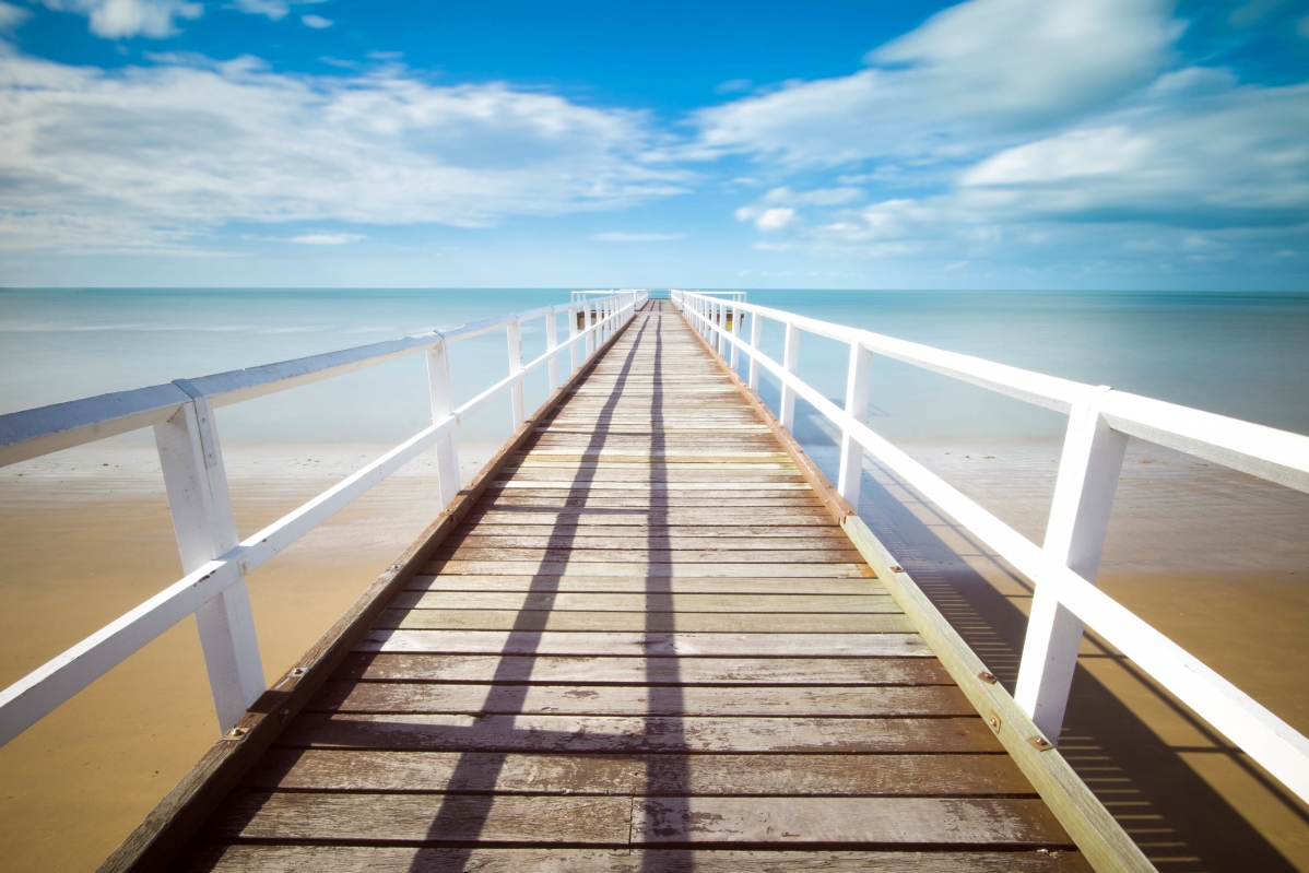 Pier ocean wooden bridge blue sky 5K