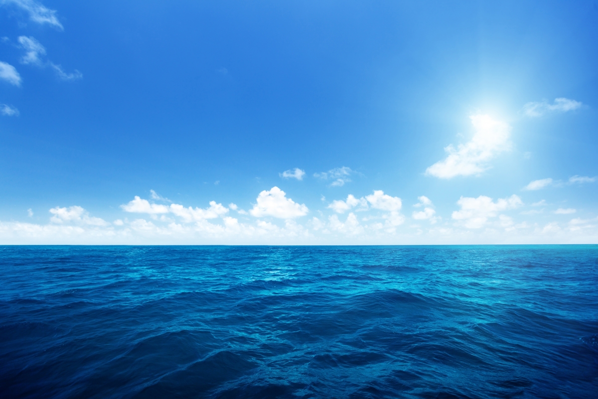 The vast sea, blue sky and white clouds
