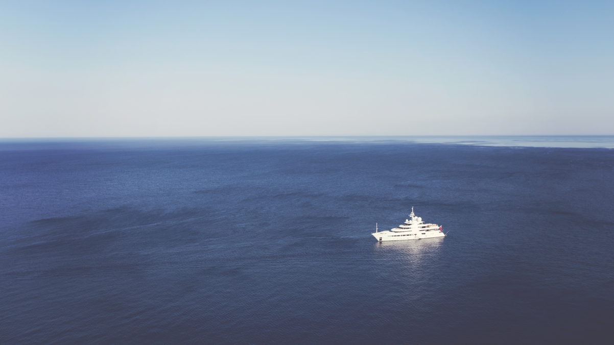 Ship driving in the blue ocean 4k wallpaper