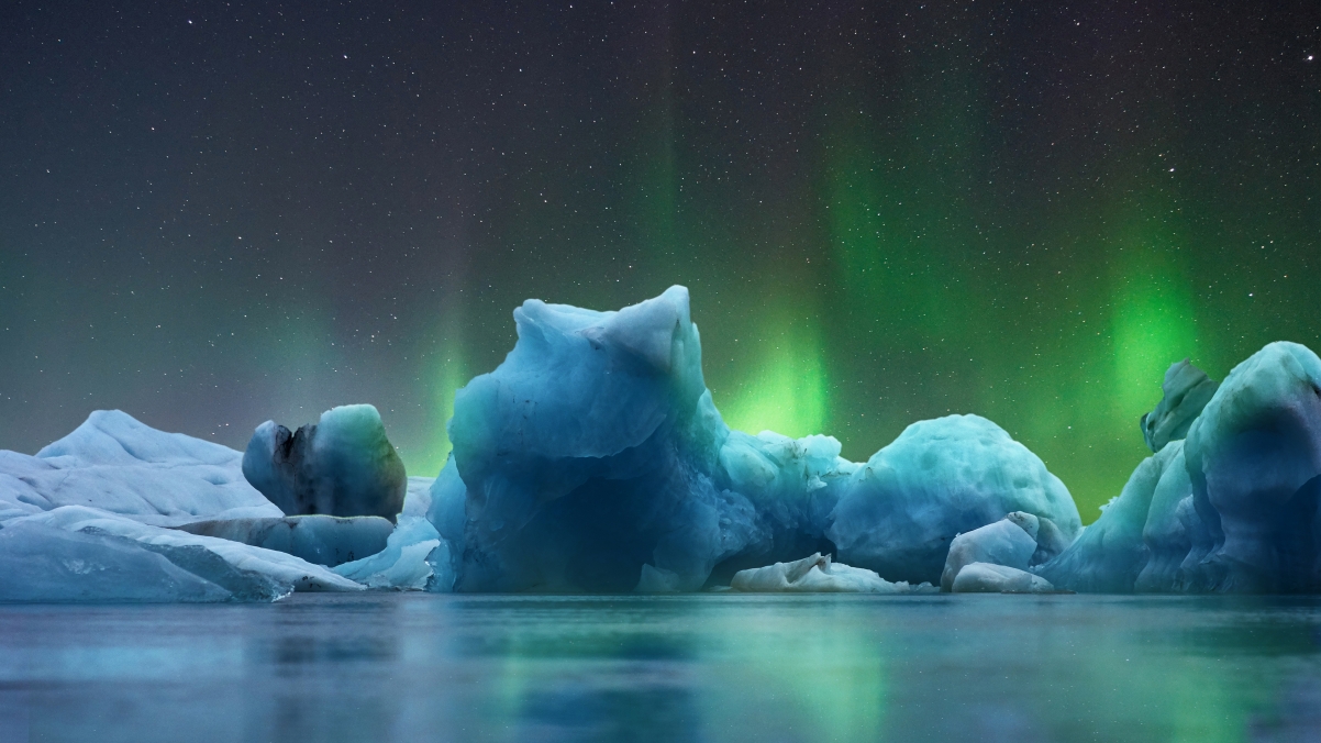 Ice northern lights glacier blue night