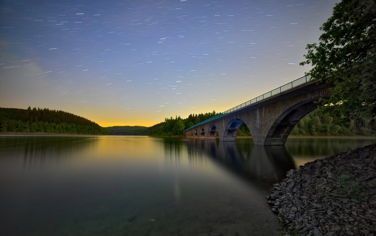 Astro night bridge lake water