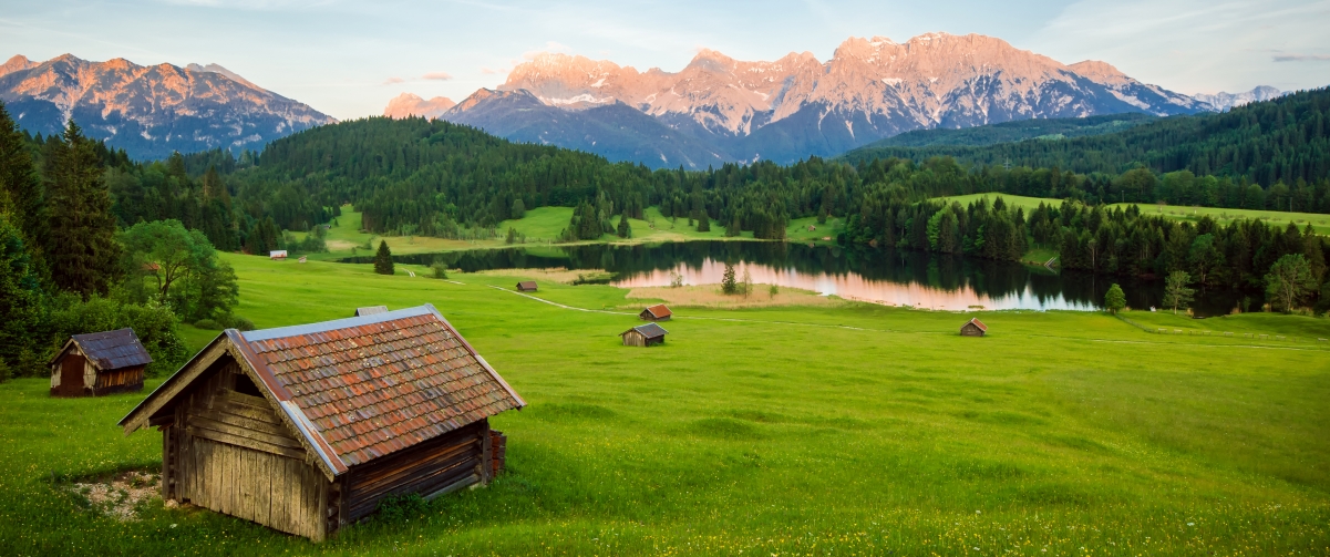 Alps mountain meadow house