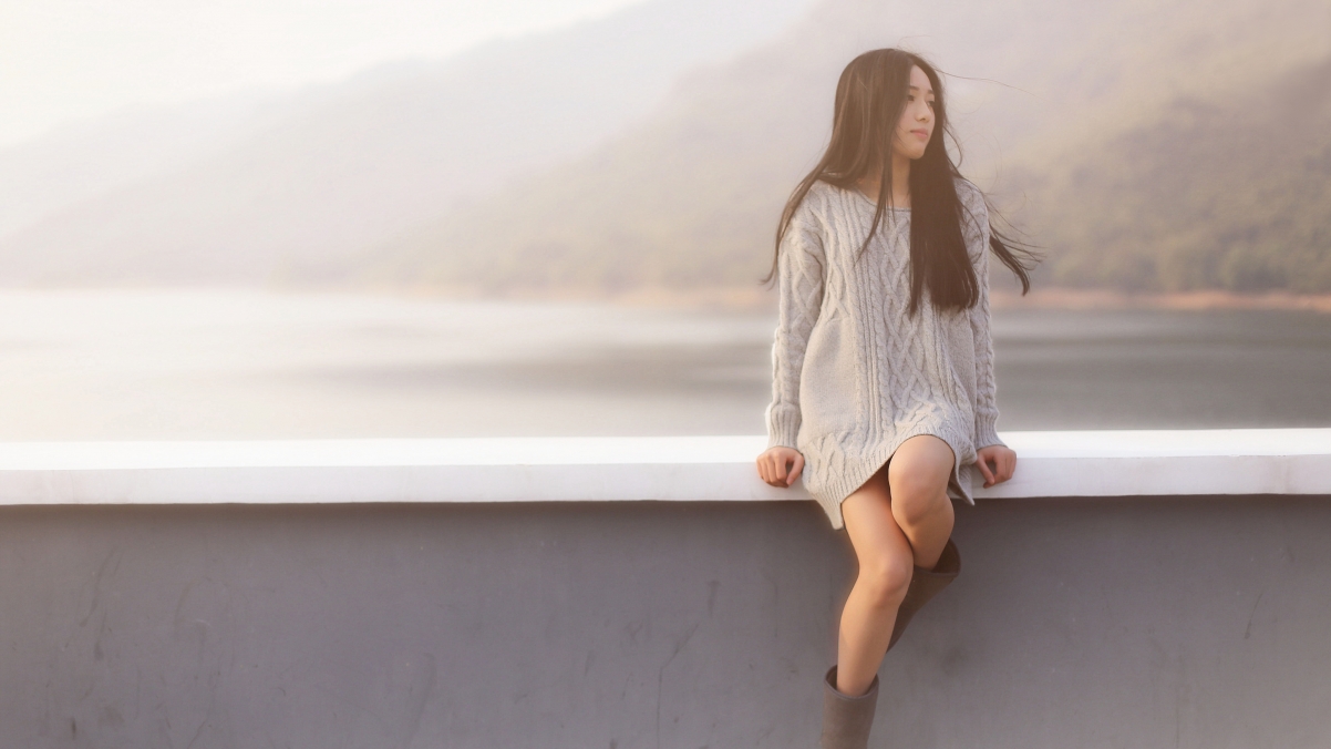 Long-haired beauty sweater dress brigade