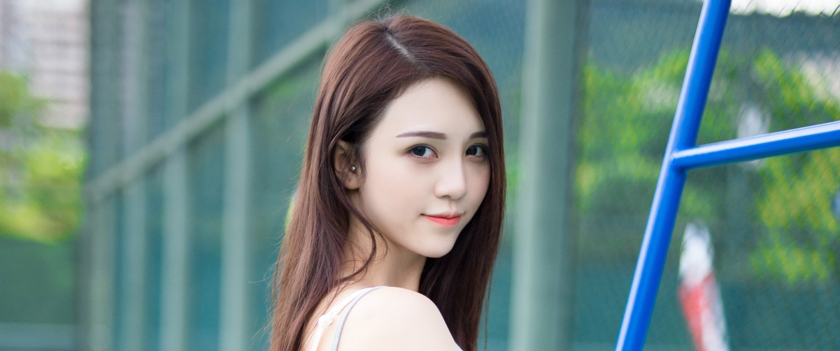 Beautiful tennis girl with long hair 3440x1