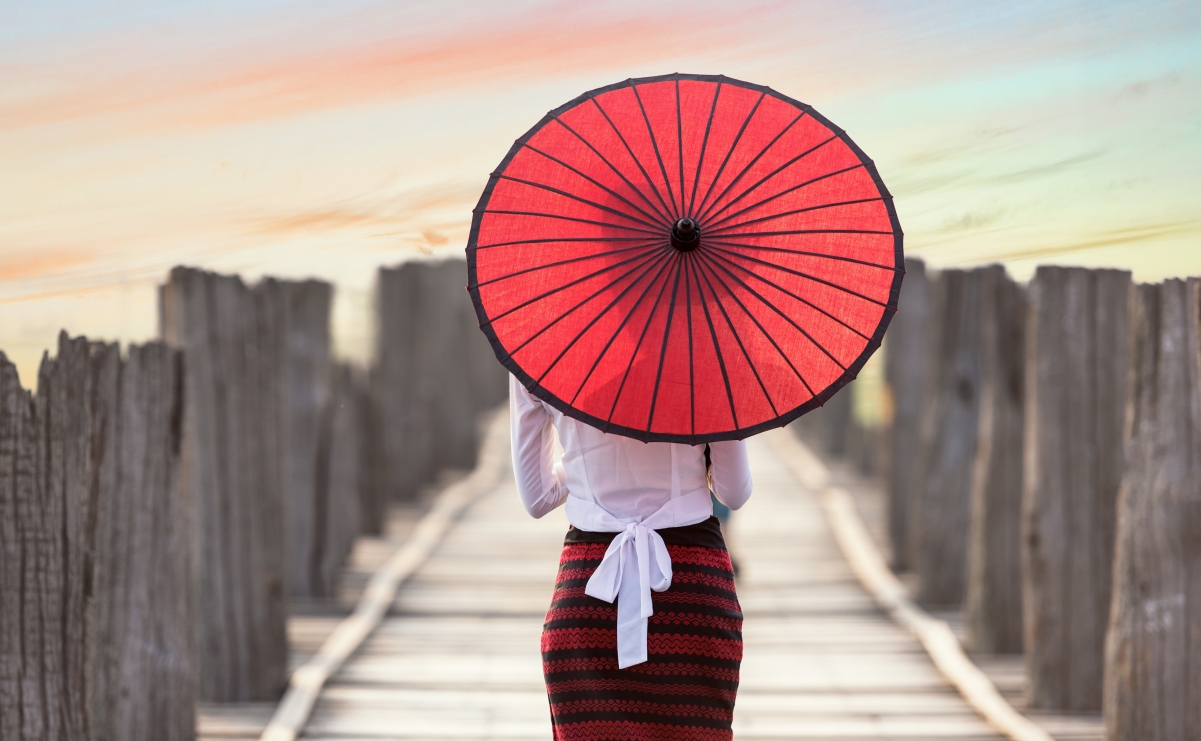 Picture of beautiful woman with oiled paper umbrella