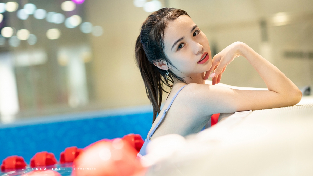 Beautiful Girl In Bikini In Swimming Pool