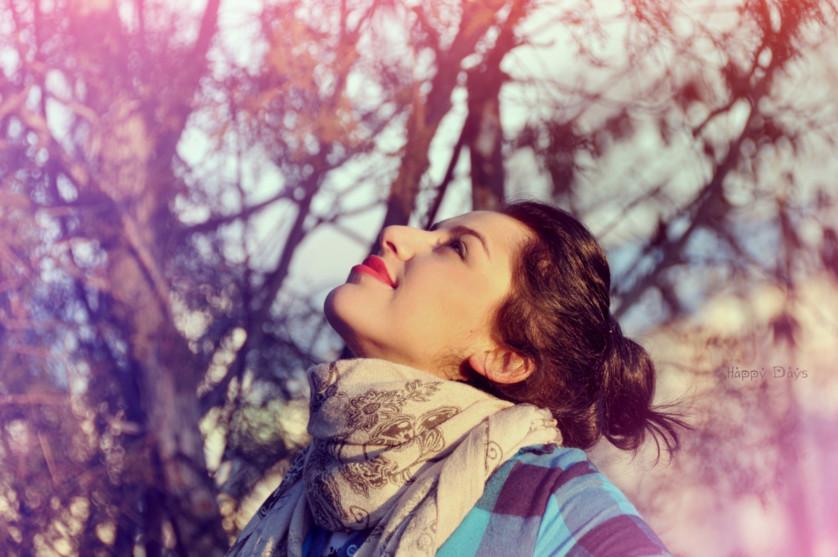 Looking up at the beauty of the scarf in the winter woods