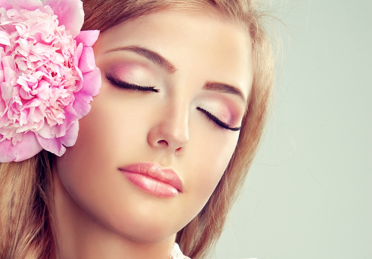 Beautiful girl with flowers smile makeup 4k