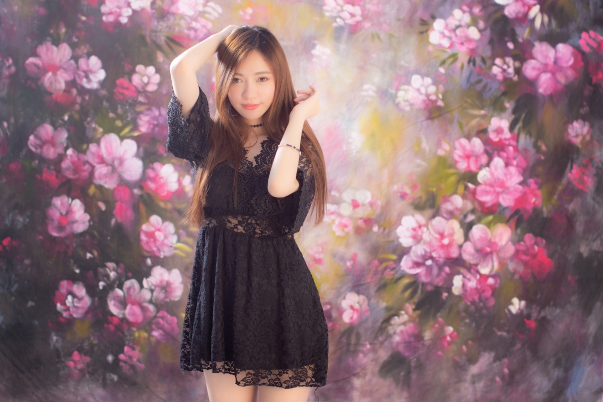Beautiful beauty in black skirt with flowers