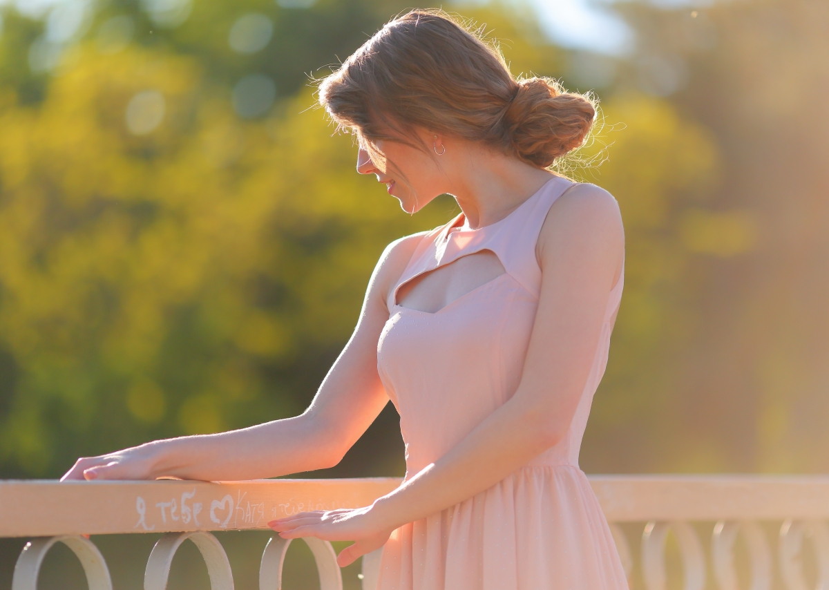 Seductive beauty in summer pink dress