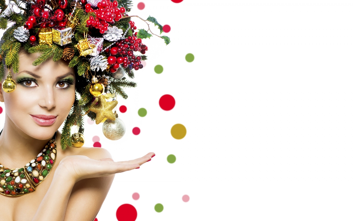 Beautiful smiling girl on christmas background