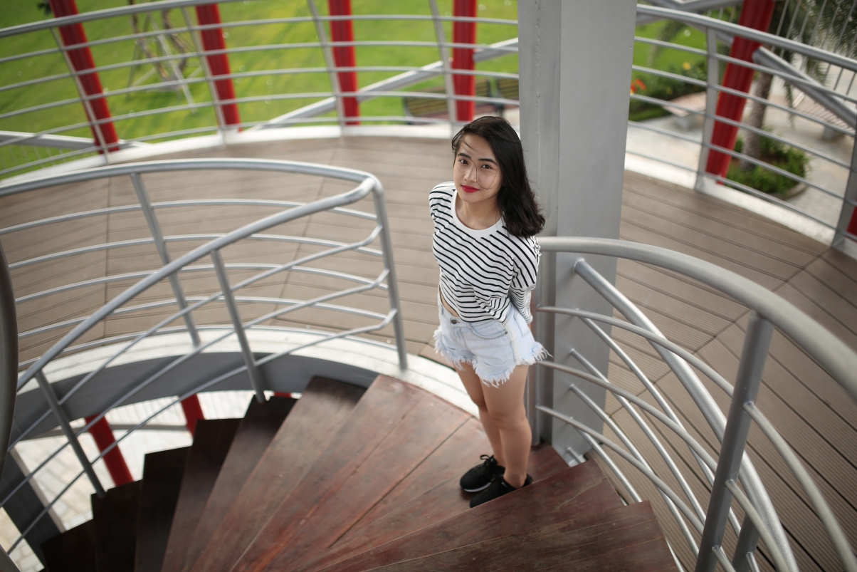Young girl smiling corner step