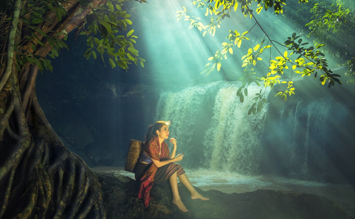 Beautiful forest waterfall sunshine girl