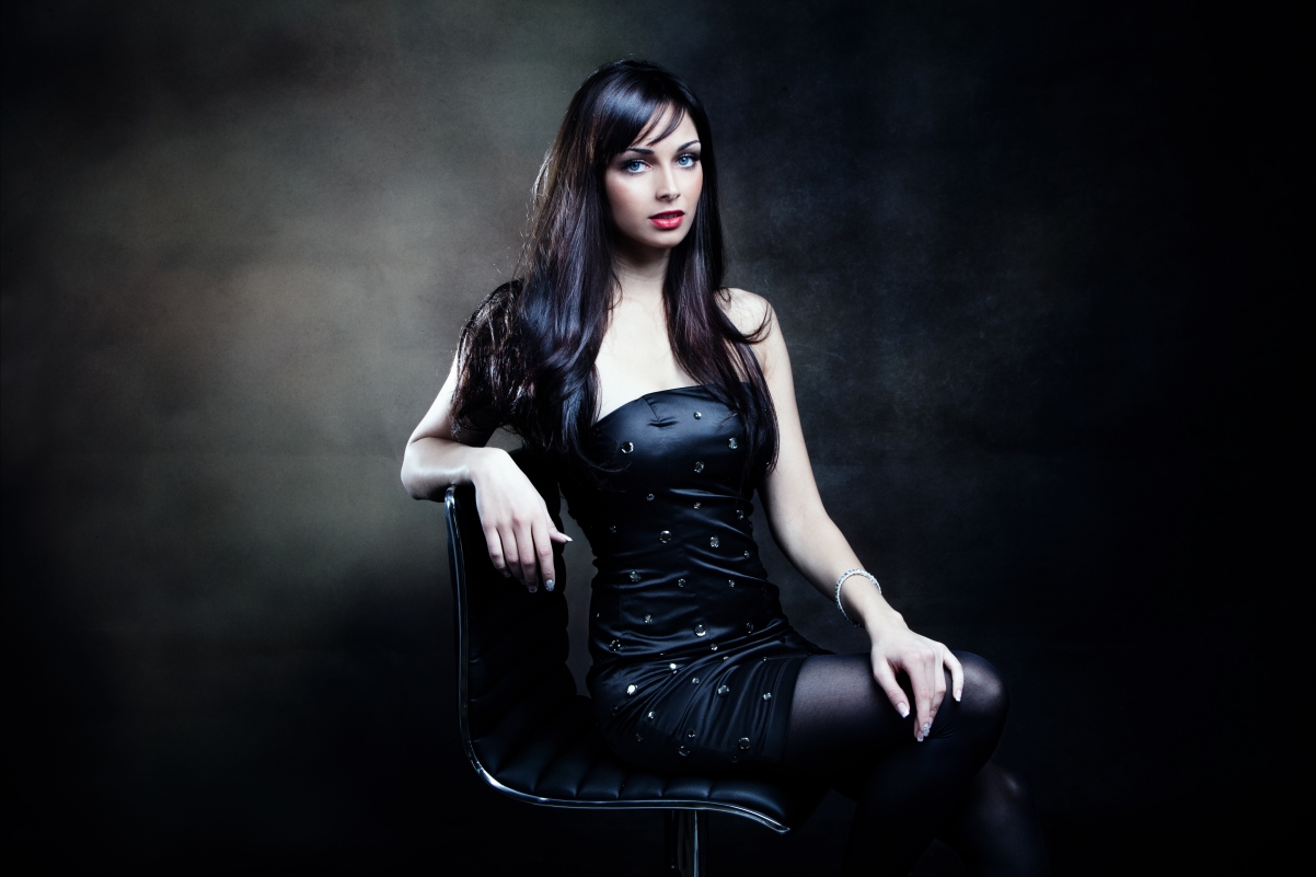 Blue eyes girl in black tight skirt
