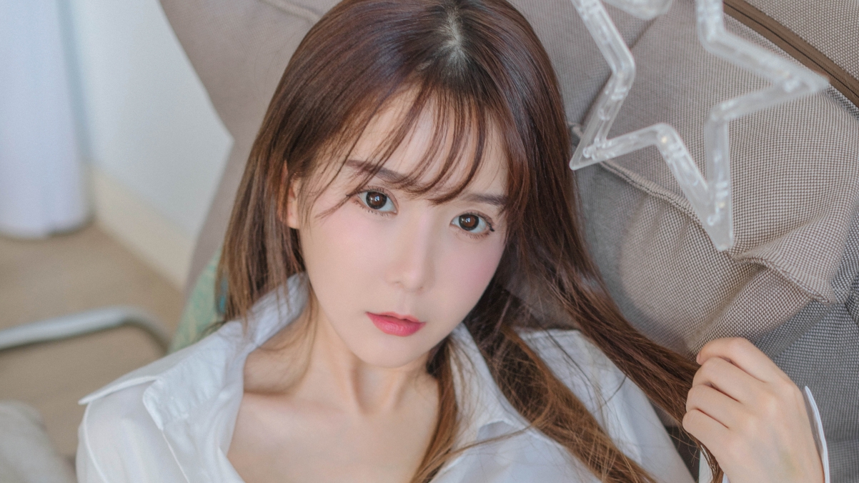 Innocent beauty in white shirt