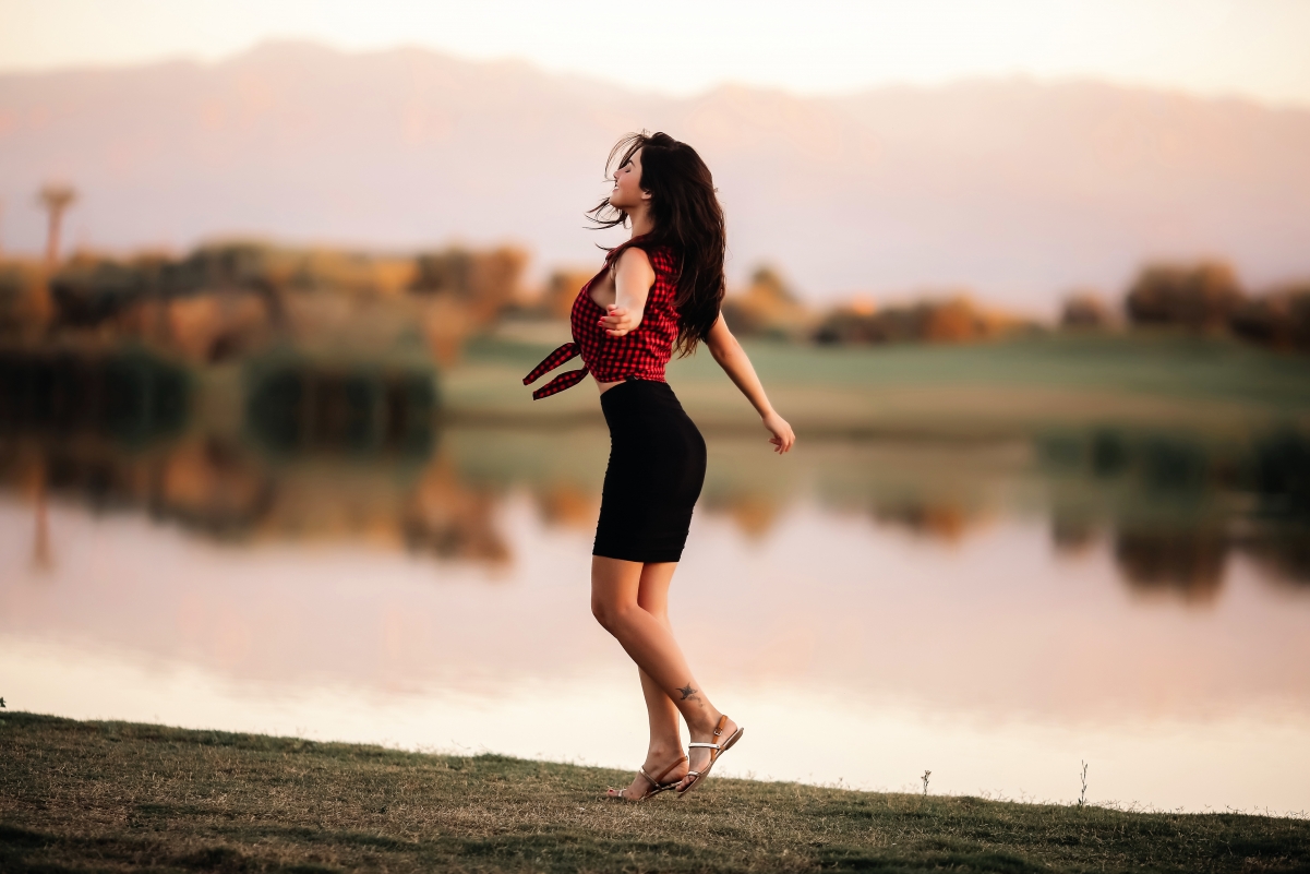 Girl dancing by the lake 5K beauty photo