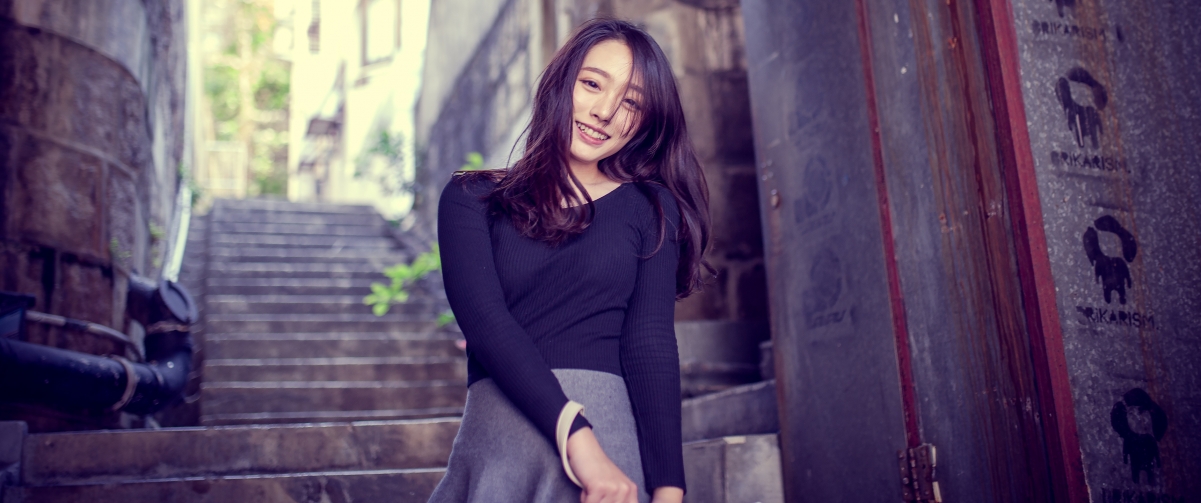 Beautiful smiling woman in black sweater 344