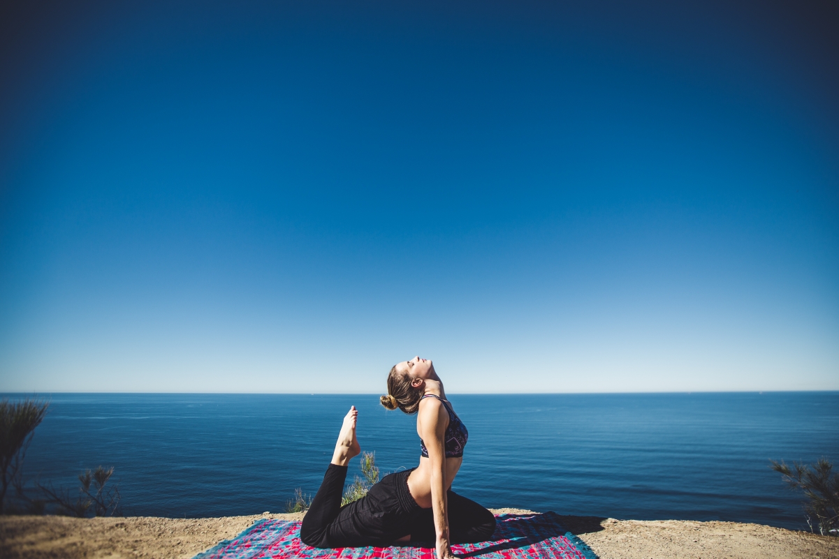 Beautiful yoga girl on the beach 5k pictures