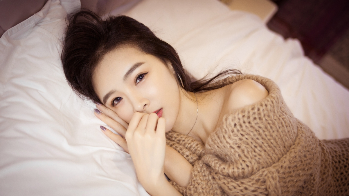 Sexy girl in sweater skirt 4K wall