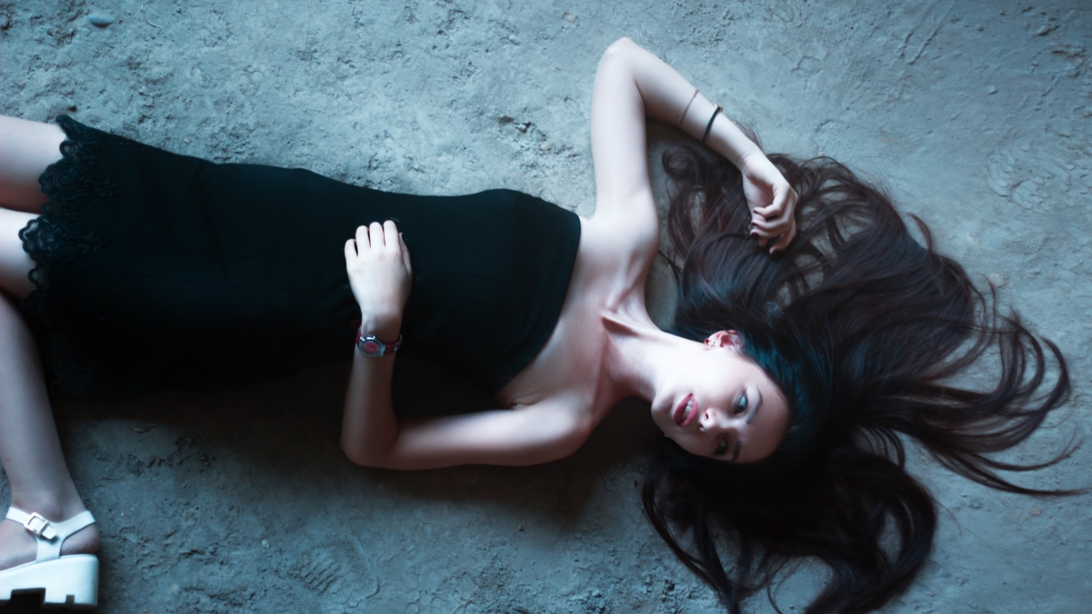 Girl in a dress on the floor