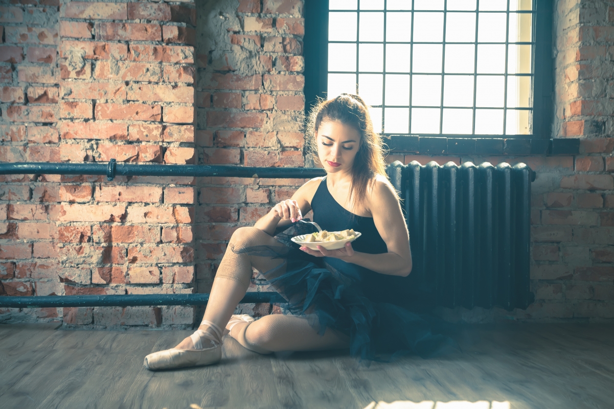 Ballerina girl rest eating snack