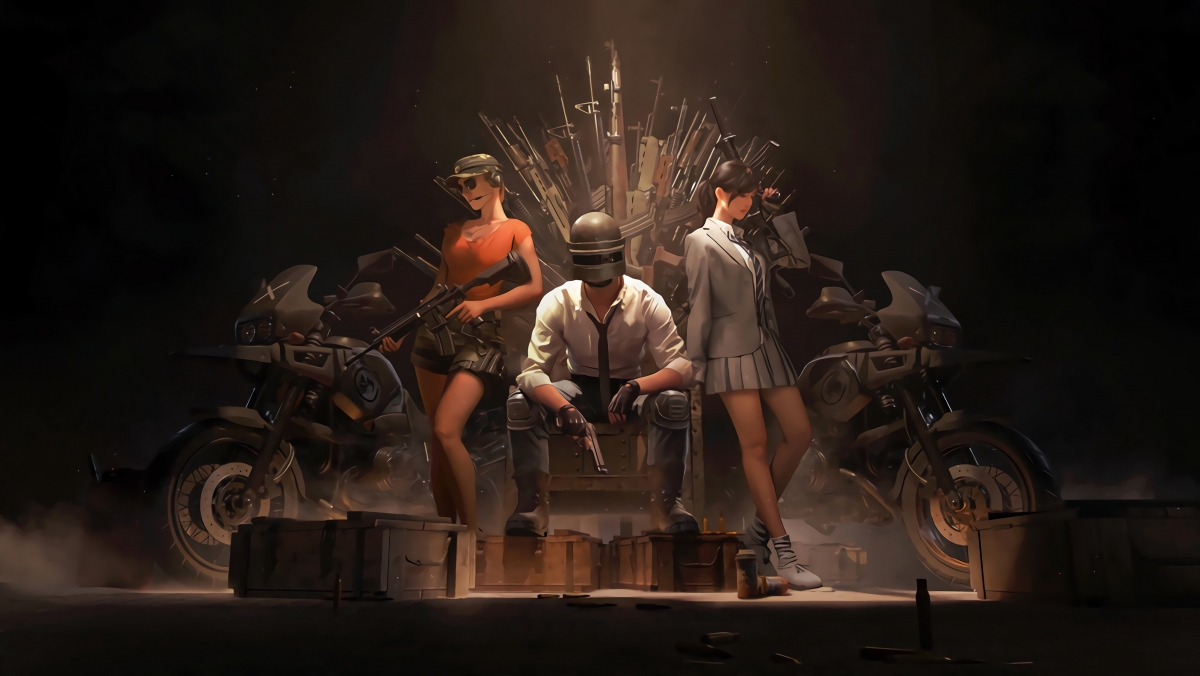 Two girls and a male with guns in helmets