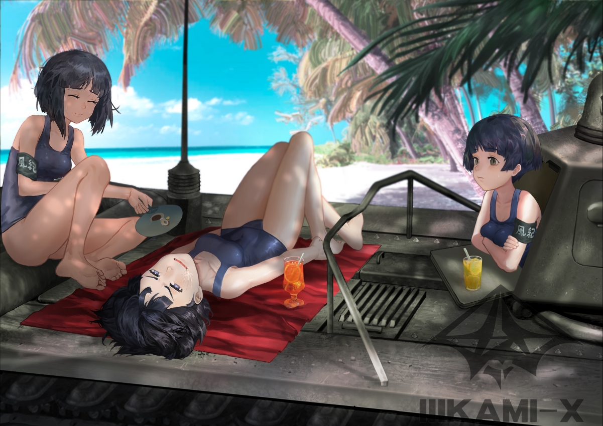 Three girls on the beach in summer