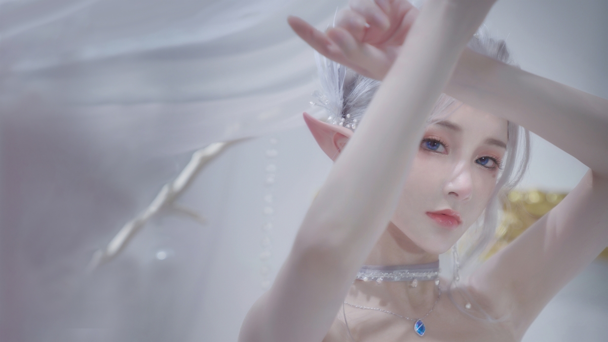 Girl elf with pointed ears and blue eyes