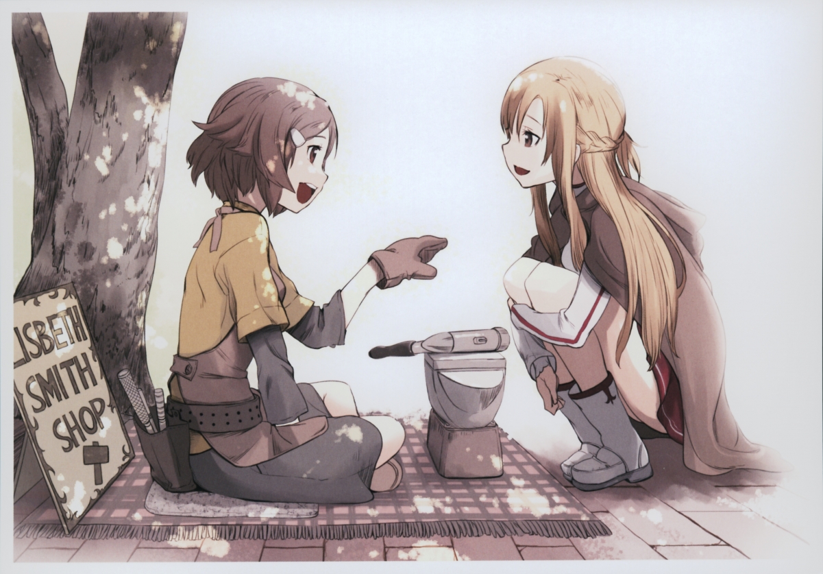 Two girls sitting under the tree and smiling