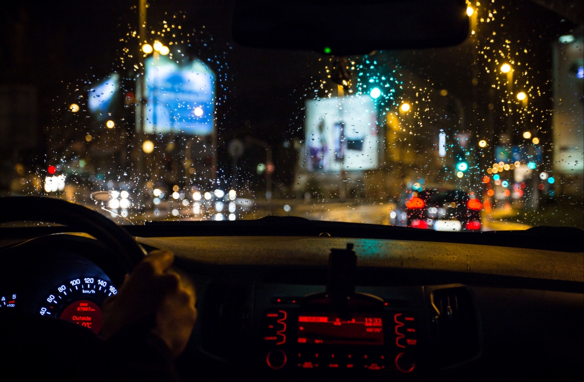 Rain glass in night city lights