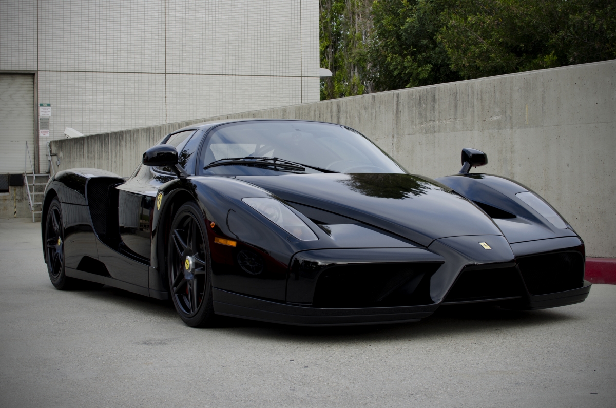 Black Ferrari Sports Car 4K Wallpaper