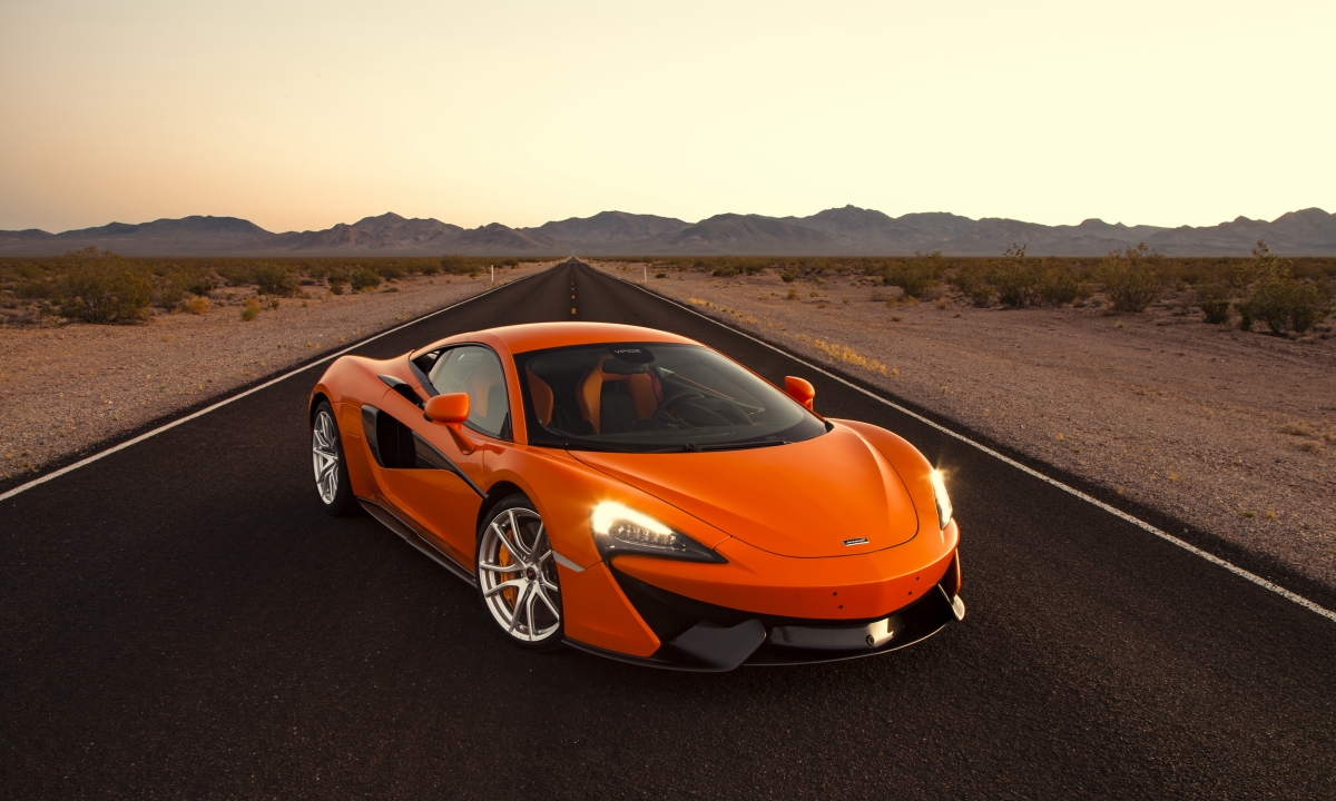 Orange sports car McLaren 570S 4K