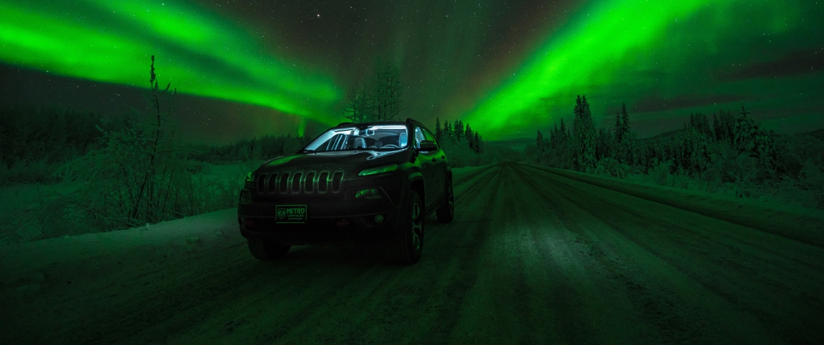 Aurora borealis car starry road