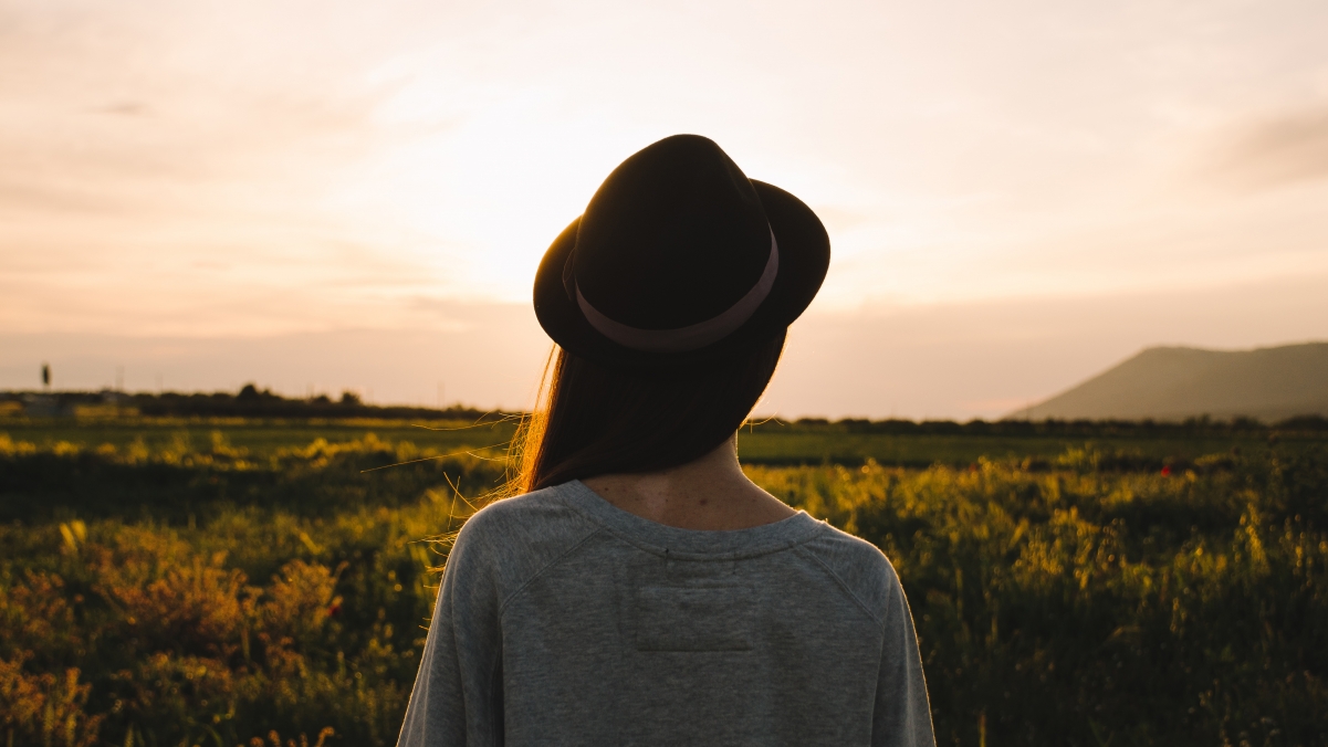 Girl looking far away 4k landscape picture