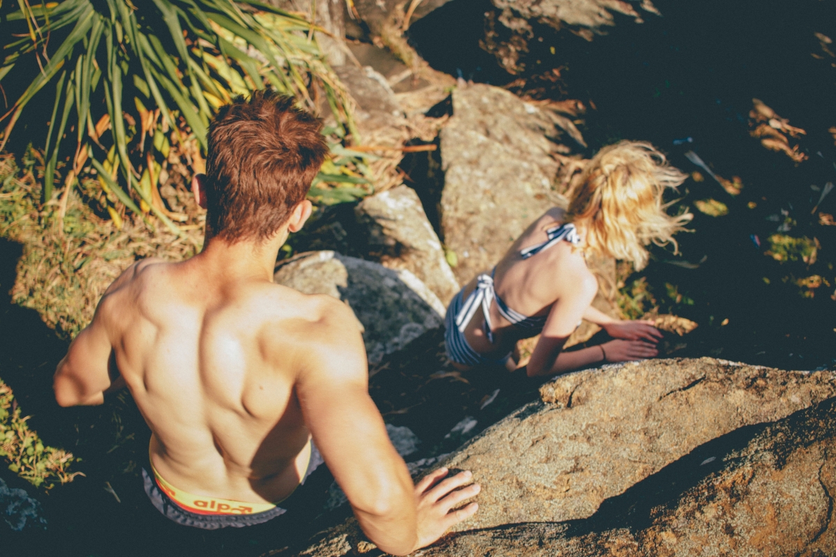 Swimsuit couple man muscular woman