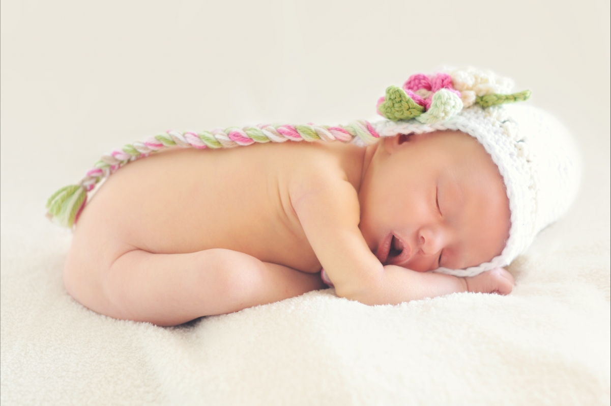 Infant baby girl baby sleeping 4k wall