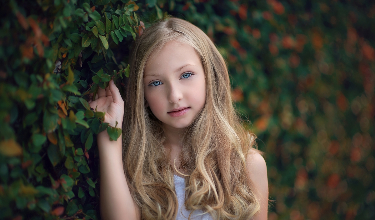 Little girl portrait cute golden long