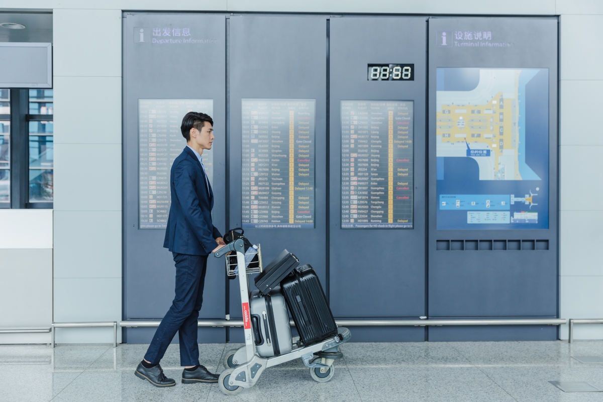Business people are traveling at the airport on a business trip