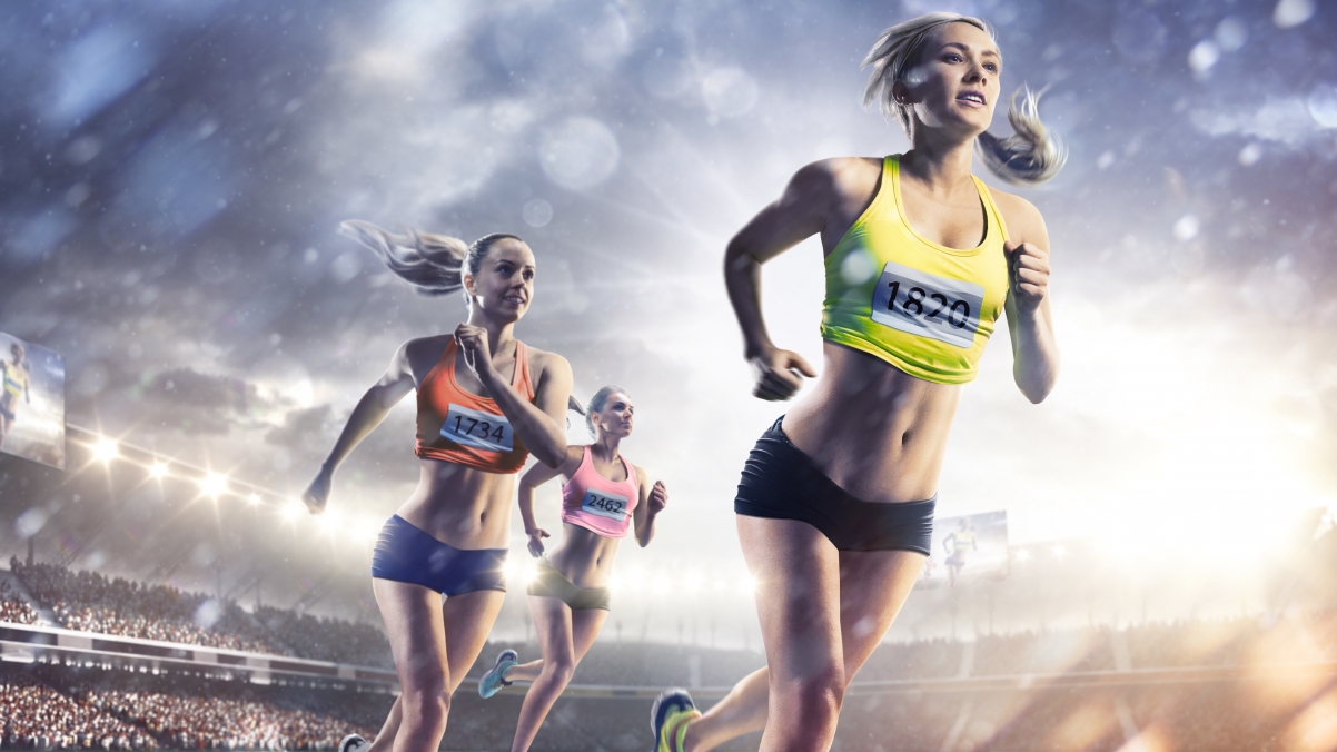 Female athlete running on track