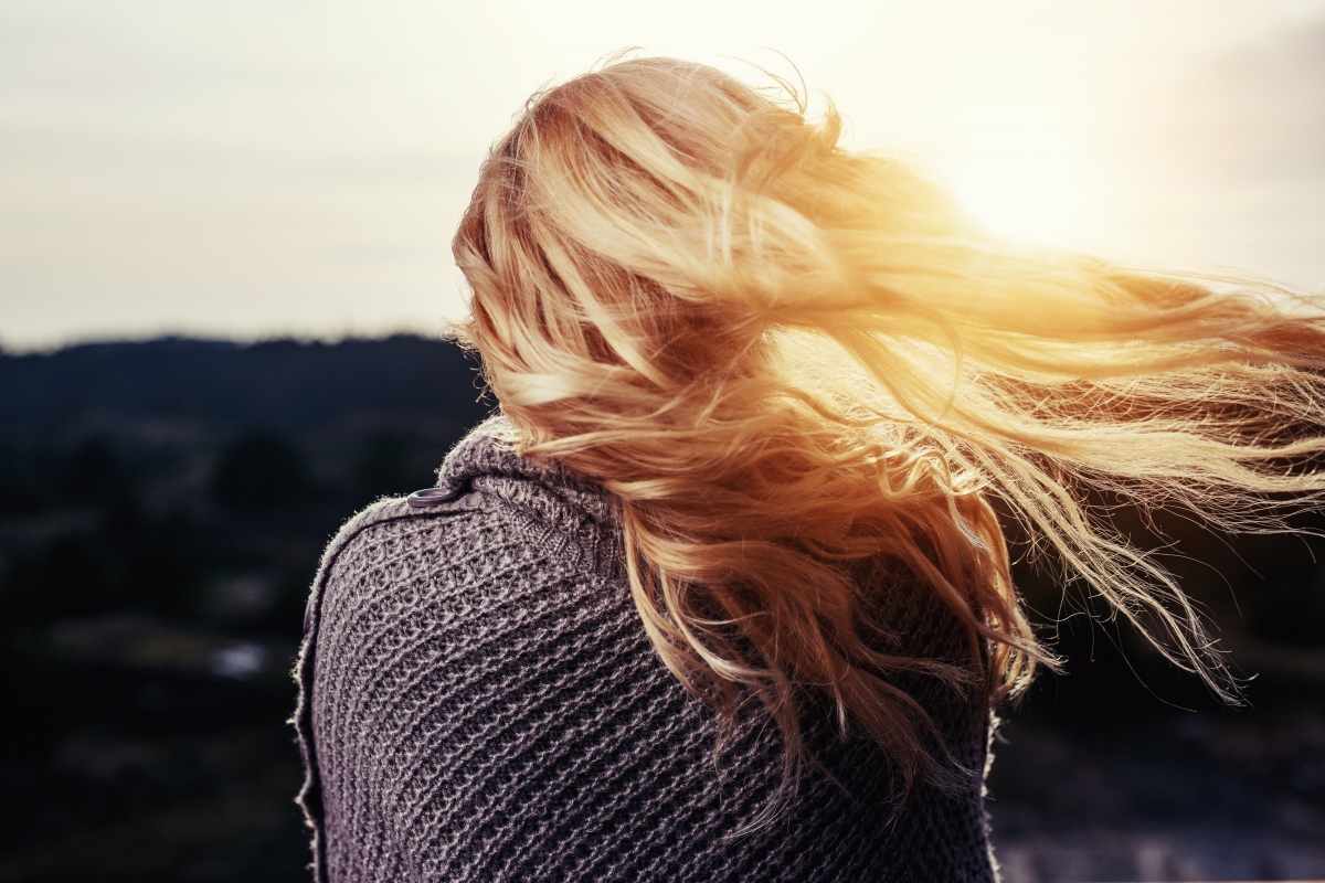 Girl with windy hair blonde female