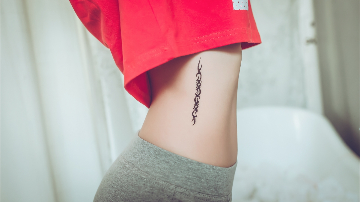 Girl figure jersey tattoo 5K