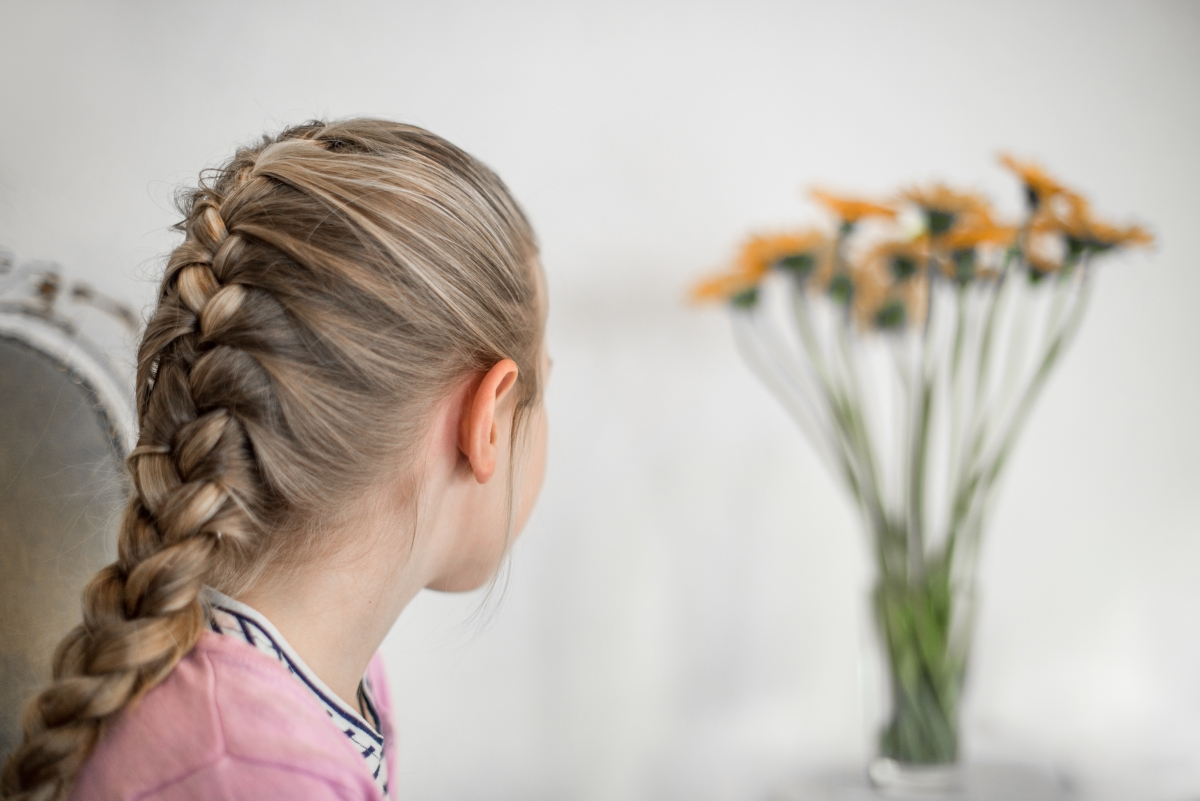 Girl with ponytail bouquet portrait