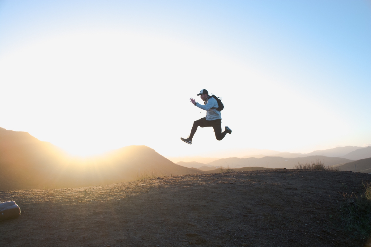Man running in the air 6K wallpaper