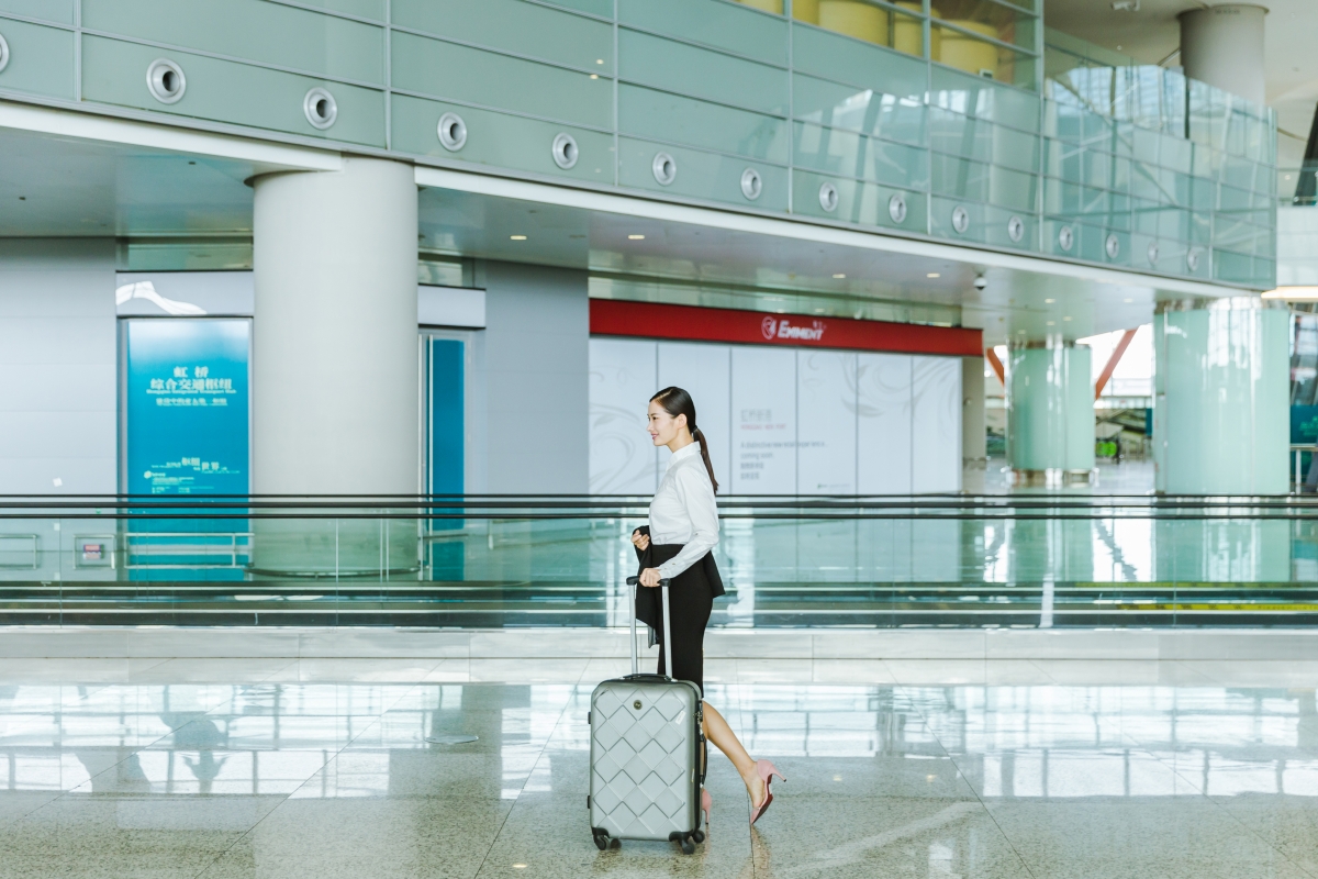 Airport business lady is traveling on business