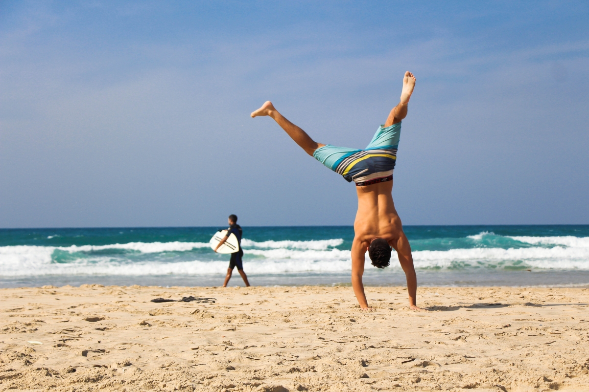 Inverted beach ocean young healthy